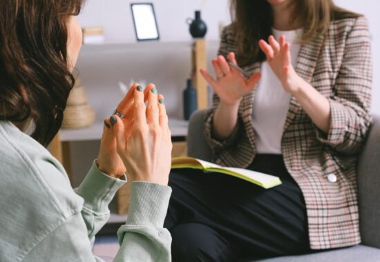 Woman talking to another woman